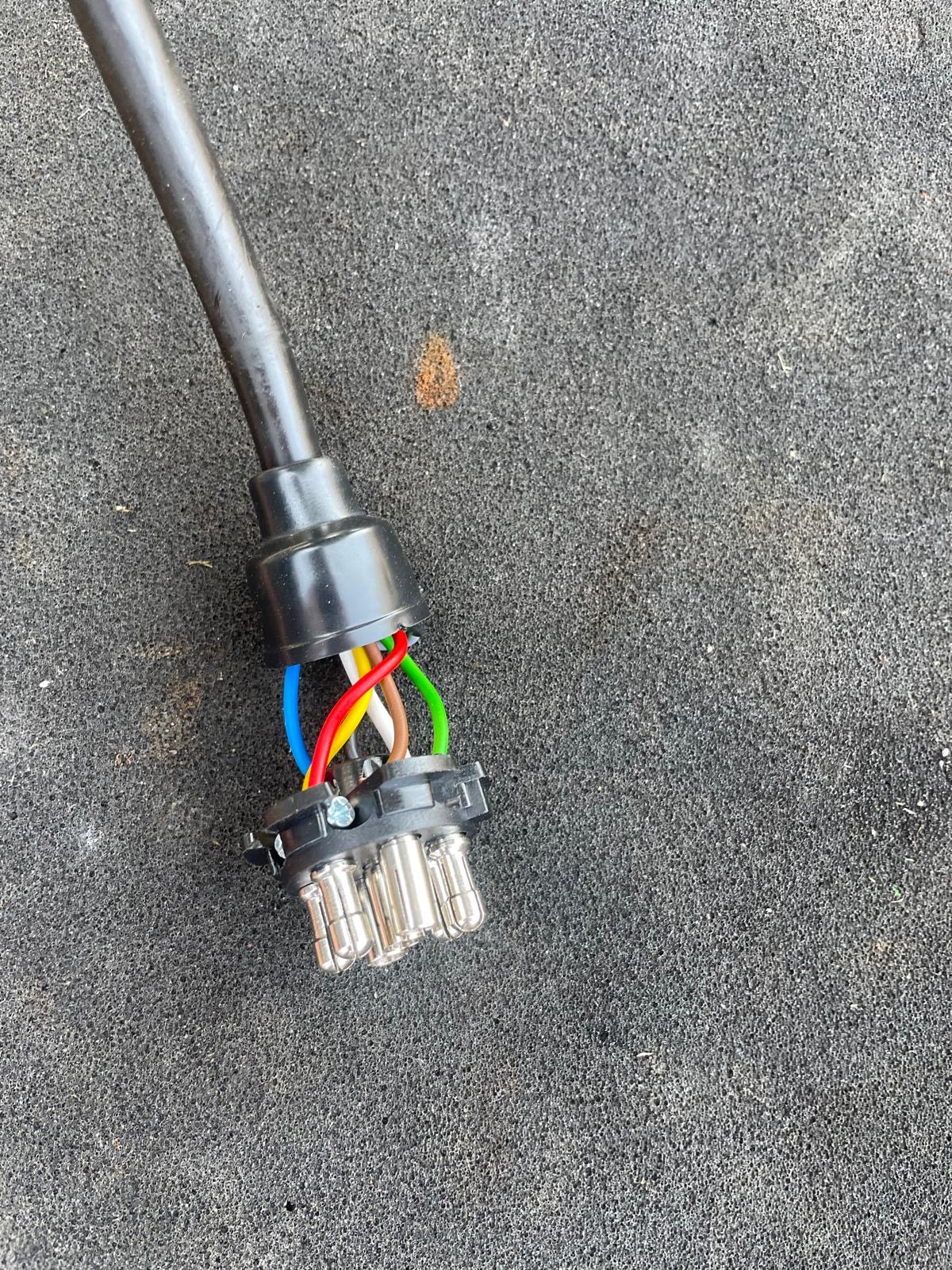All 7 wires connected to the correct pins inside a 12N trailer plug ready for testing