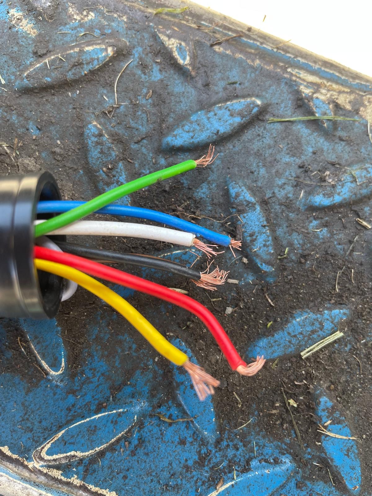 7-core trailer cable with wires stripped and ready to connect to the 12N plug terminals